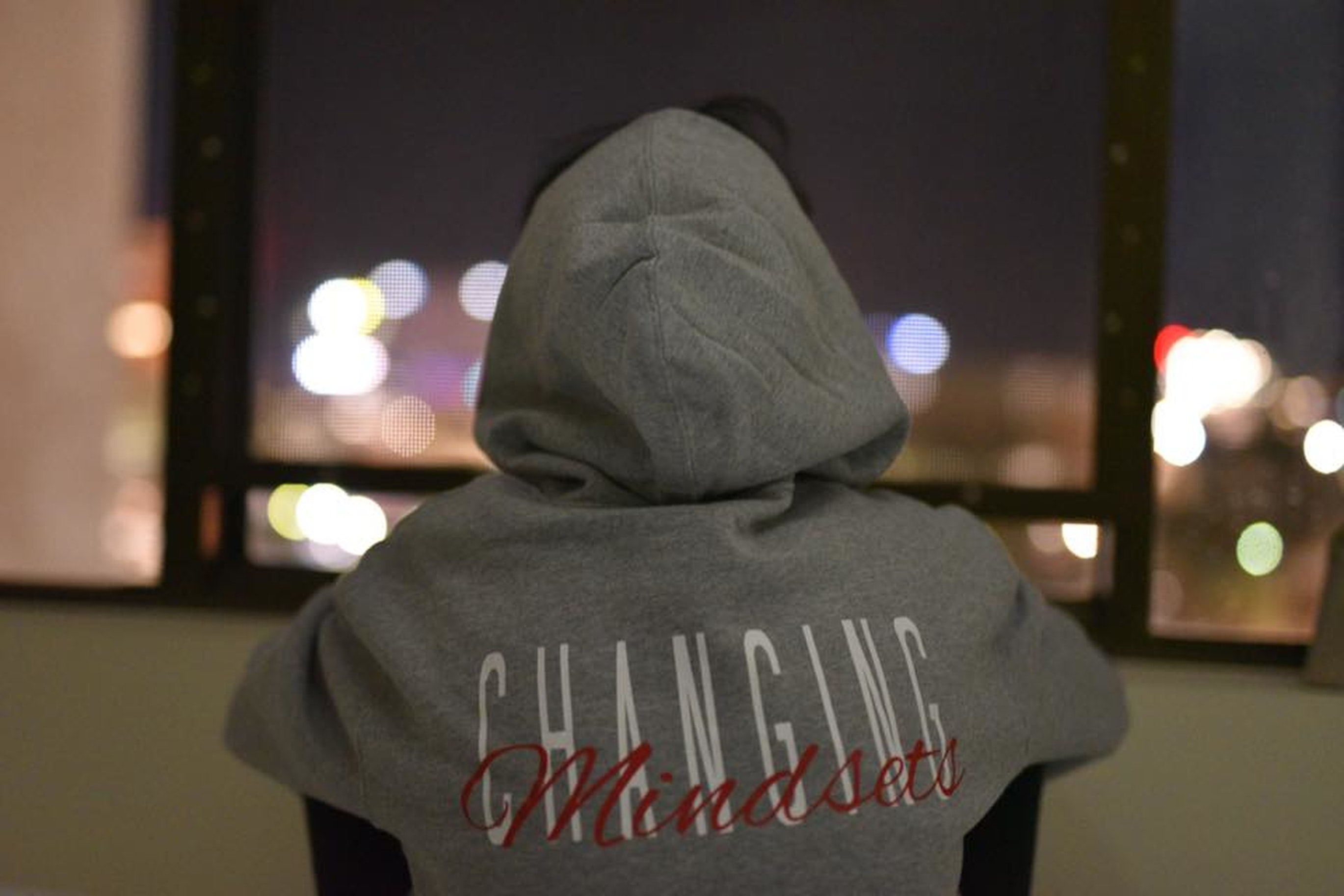 Person in hoodie that says 'Changing Mindset'